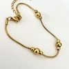 Pulsera con bolitas en Acero baño Oro, 18 + 5 cm - comprar online