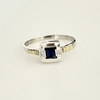 Anillo en Plata y Oro con Cubic Azul y Zirconias