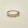 Anillo medio sin fín en Plata y Oro con 4 Cubic