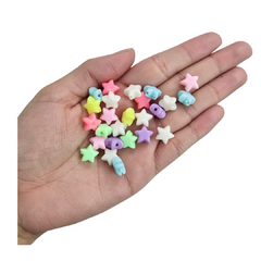 PLÁSTICO PASTEL ESTRELLAS PASANTES CHICAS 11 MM. en internet