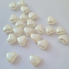 CORAZONCITOS PLASTICOS PERLADOS PASANTES (10 grs) en internet