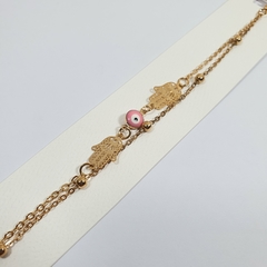 PULSERA DORADA OJO ROSA + MANO (1 UNIDAD)