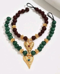 Colar coração verde na internet