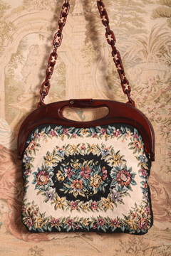 Bolsa anos 70 de tapeçaria na internet