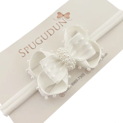 Laço Antônia Cravejado de pérolas (Unidade) na internet