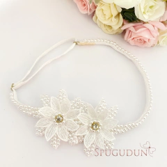 Flor de guipir bordada na faixa bordada