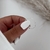 Anel de prata torcido minimalista na internet