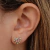 Brinco coração cravejado pequeno com micro zircônias coloridas Banhado em Ouro 18k