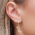 Brinco Argolinha com pingente Star cravejado em micro zircônias folheado em Ouro 18k