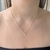 Colar Gargantilha Coração Cravejado de Zircônias Color Banhado em Ouro 18k - comprar online