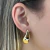 Brinco Gota Grande Amassada Banhado em Ouro 18k - comprar online