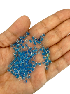 Miçanga 6/0 - TRANSPARENTE COM MIOLO AZUL - comprar online