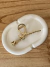 Broche Romance dorado