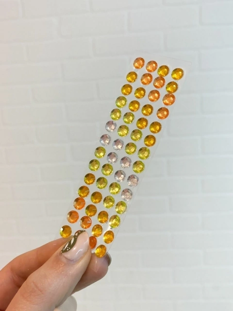 Strass autoadhesivo M plateado/lima/amarillo/naranja