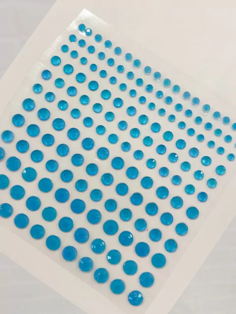 Strass autoadhesivos neon y luminiscentes individuales celeste