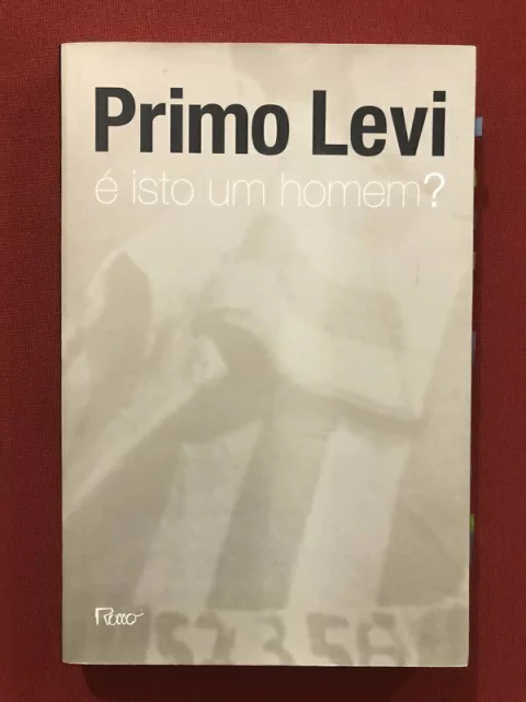 Livro - É Isto Um Homem? - Primo Levi - Ed. Rocco - Seminovo
