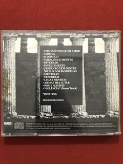 CD - Titãs - Jesus Não Tem Dentes No País Dos Banguelas - comprar online