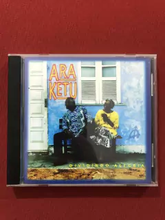 CD - Ara Ketu - Dividindo Alegria - Nacional - Seminovo