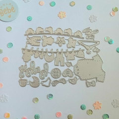 Set de 20 troqueles Ropita de bebé y ornamentos
