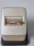 Anillo oro 18klts medio sin fin con cubic peso 2 gramos