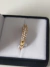 Imagen de Anillo oro 18klts medio sin fin con cubic peso 2 gramos