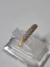 Anillo oro 18klts medio sin fin con cubic peso 2 gramos