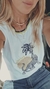 Remera sin manga com Reeb en internet