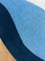 Tapete redondo com faixas de cores em azul petróleo e azul marinho, São José.