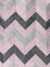 Tapete nas cores rosé, nescau e grafite em padrão zig-zag.