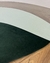 Tapete Kurve® com bordas orgânicas em tons de verde, verde claro e granito.