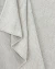 Tapete de fibra natural off-white, tecido à mão em tear manual, com textura tramada e acabamento retangular, da Coleção Zeland 01, Tapetes São José