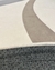 Tecido Bouclé Capri nas cores natural, cinza e cappuccino com detalhe de textura perfurada.