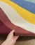Tapete redondo Wave de nylon com design colorido em tons de vinho, cobre, off-white, azul petróleo, amarelo, verde e verde escuro, Tapetes São José