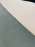 Detalhe do Tapete Íris com bordas orgânicas em tons de preto, off-white, verde, verde claro e granito, São José.