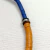 Colar modular com Paetês Reutilizados bicolor azul royal e laranja - estúdio marcha - lendária