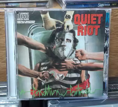 Quiet Riot Condition Critical