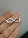 Dije Infinito con piedras