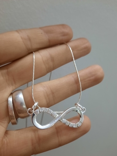 Dije Infinito con piedras - tienda online