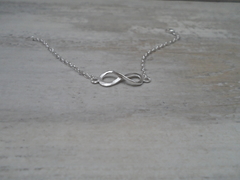 Pulsera rolo fina con dije infinito - comprar online