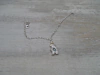 PULSERA ROLO FINA CON DIJE NENE