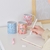 Taza Indonesia - Clips Cuadernos