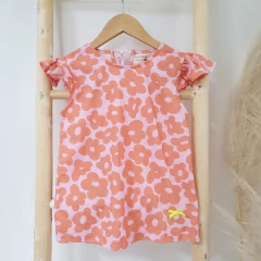Musculosa Agatha flor naranjita