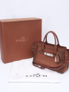Bolsa Coach Brown Tote Turn Lock na internet