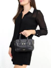 Bolsa Coach Small Black Crossbody na internet