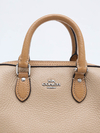 Bolsa Coach Mini Rowan na internet