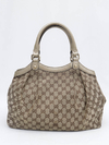 Bolsa Gucci Sukey Dourada na internet