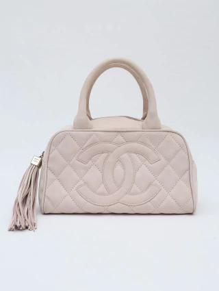 Bolsa Chanel Tassel Bowler na internet