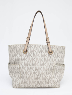 Bolsa Michael Kors Jet Set Monograma na internet