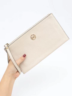 Clutch Michael Kors Off White na internet