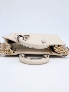 Bolsa Michael Kors Mirella Mini na internet